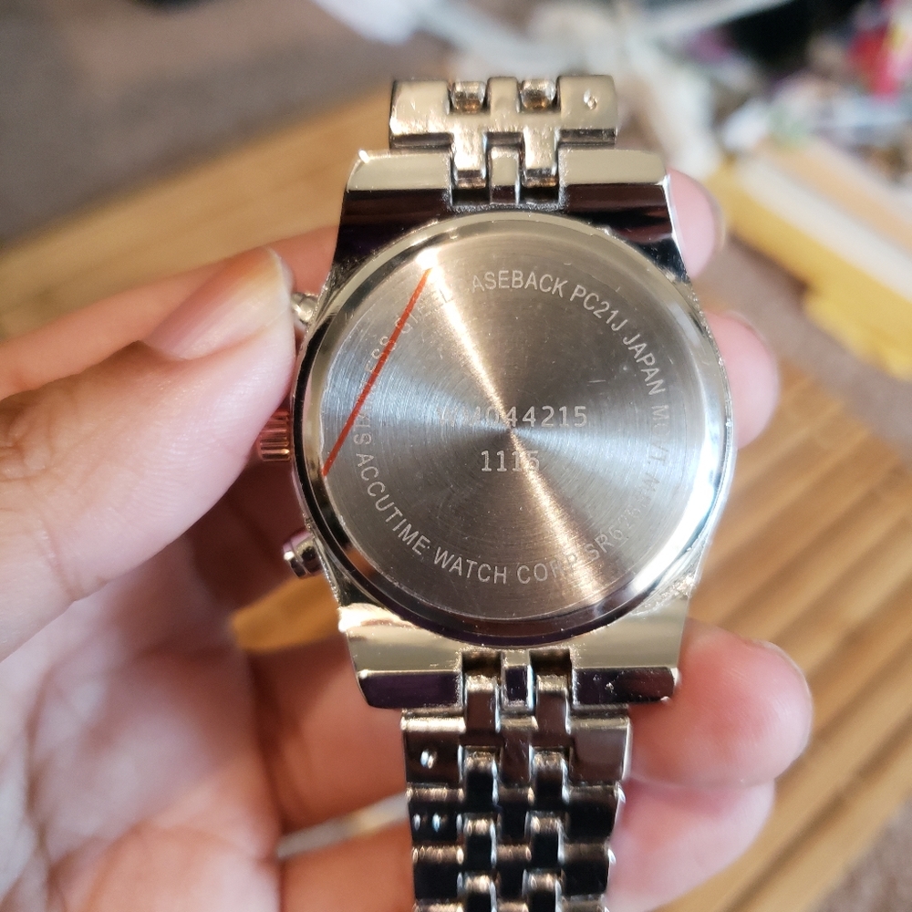 Women's Rosegold faced, mixed metal watch